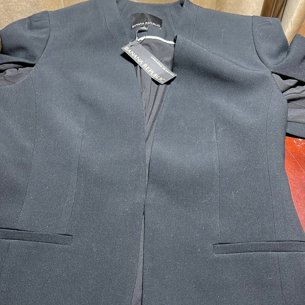 Brand new with tags, women black, banana republic , size 4 jacket.